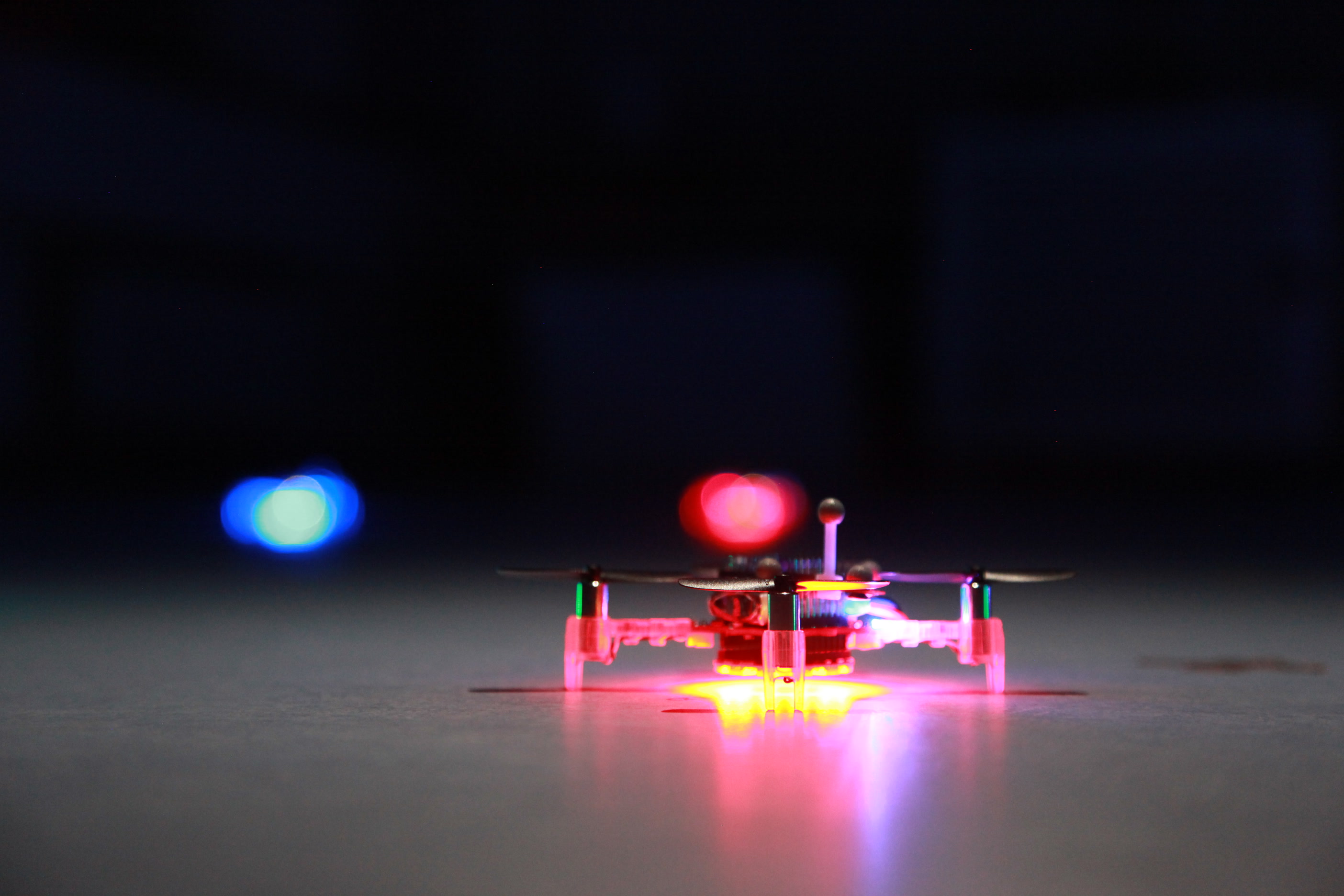 SwarmGPT drones in flight